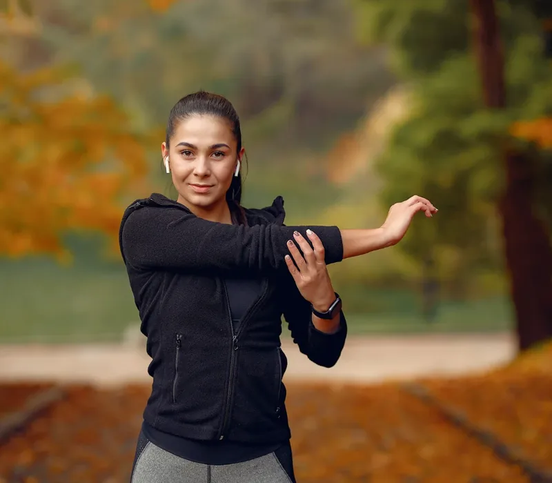An active adult training outdoors after finishing rehab