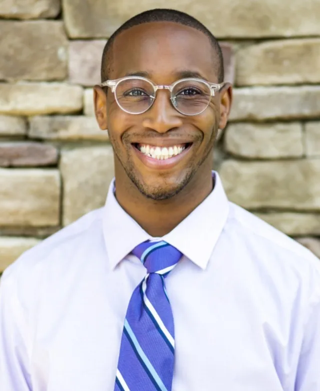 Portrait of Dr. Christian Harris, founder of Harris Physical Therapy and Wellness