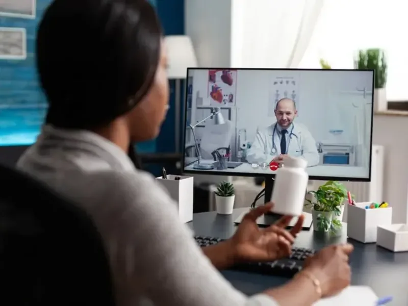 Doctor of Physical Therapy leading a one-on-one virtual physical therapy session